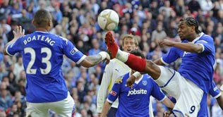 Portsmouth cruises to FA Cup final